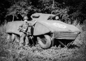 Soldier inf ront of inflatable car