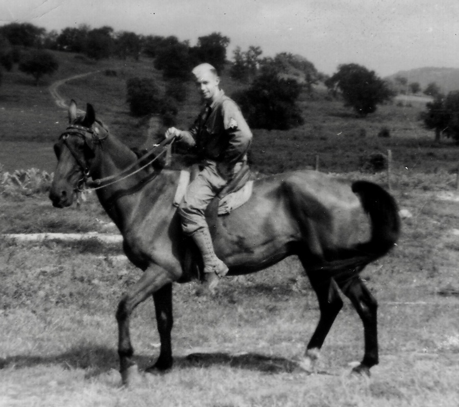 Photo of Allen Brewer on horseback while part of the 603rd Engineers