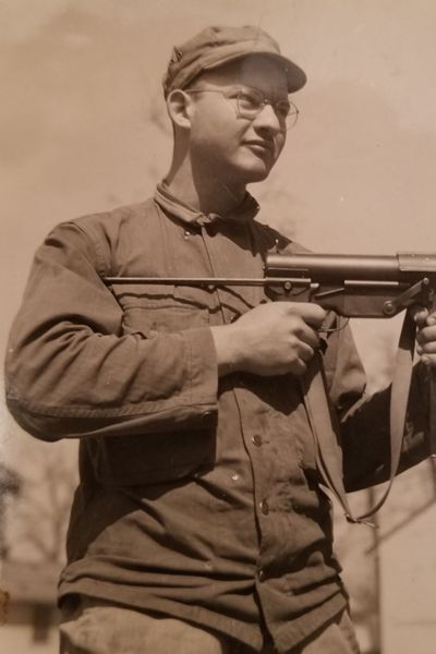 photo of Bernard Bernie  with gunBluestein, PFC in The Ghost Army, 603rd Engineer Camouflage Bn, HQ & Service Co, asn#35053225