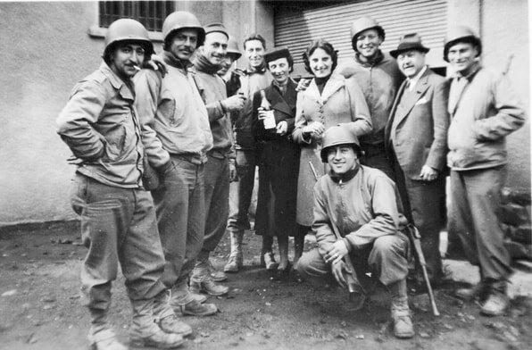 Group of eight soldiers with three French civilians