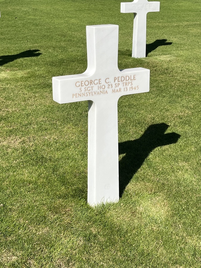 George Peddle's cross-shaped gravestone