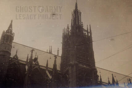 ww2 image of the top of a cathedral from the ground
