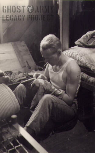 Soldier next to his bunk WW2