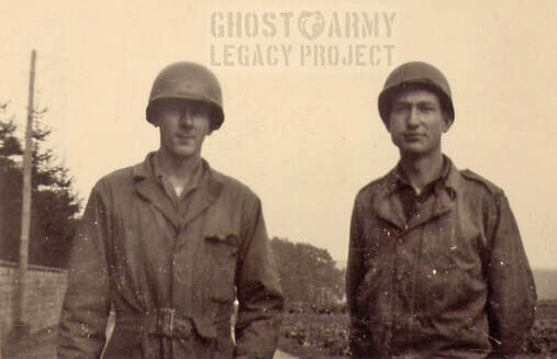 two soldiers in a field in world war 2