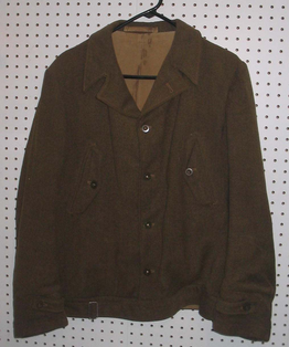 military jacket displayed on a hanger