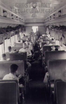 interior of a train in 1940s filled with soldiers returned from war