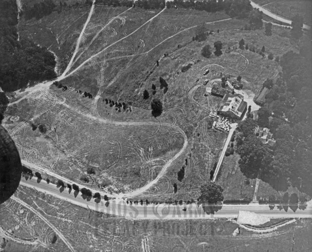 arial view of farmhouse surrounded by decoy vehicles ww2